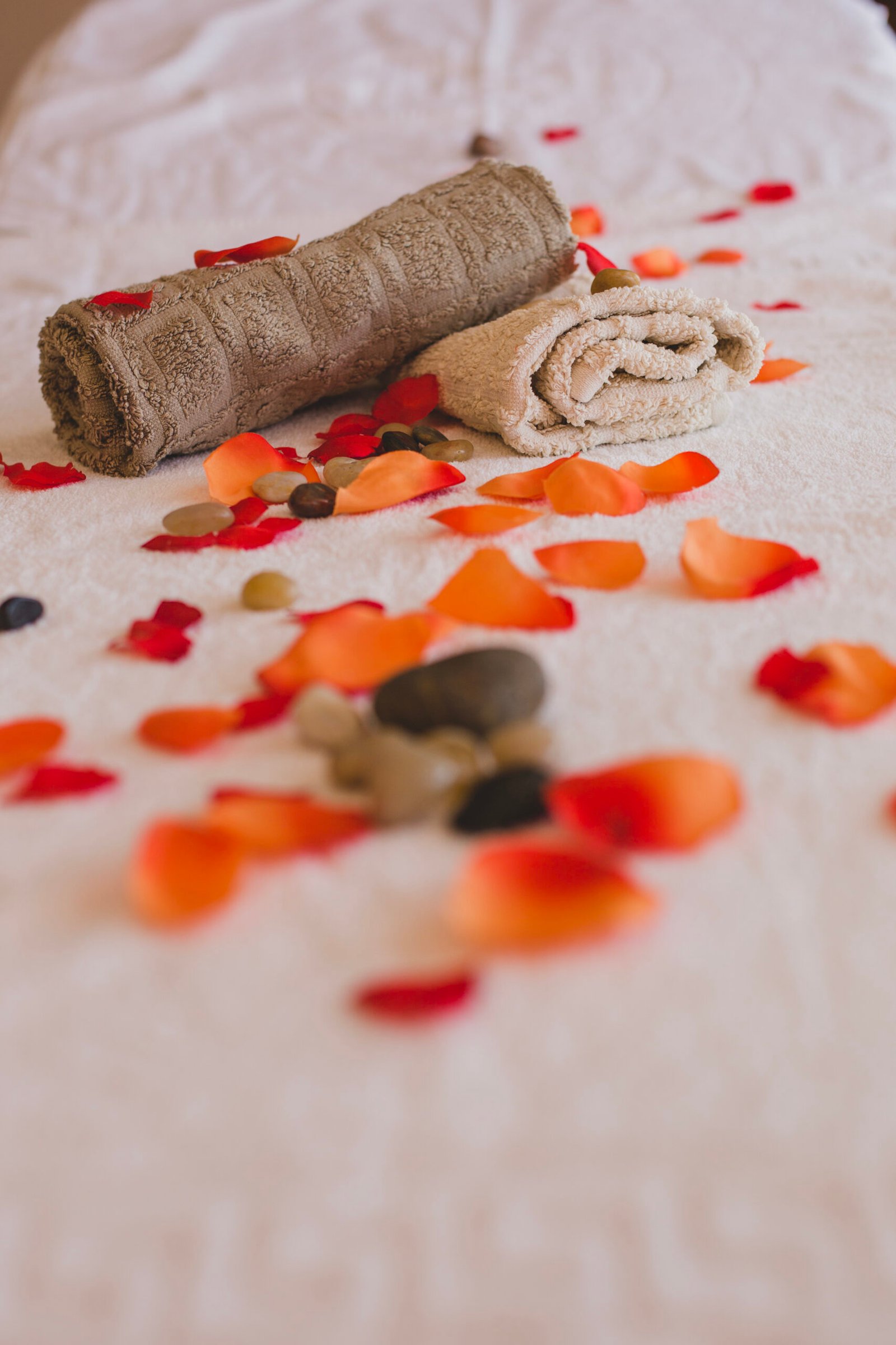 fresh petals stones with towels